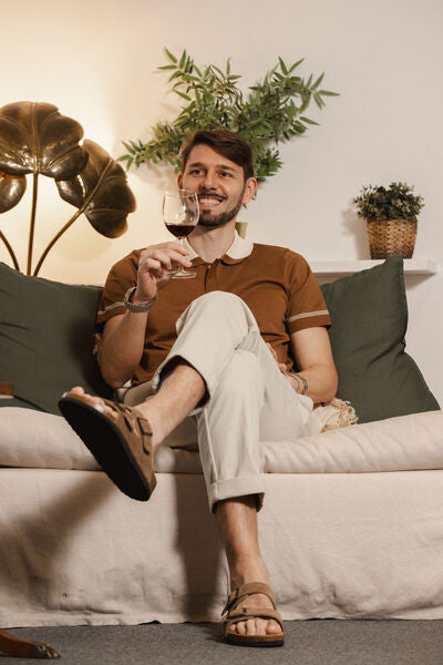 Knit polo, linen trouser, leather sandal.